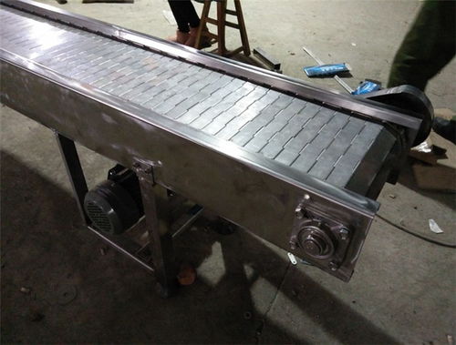 不銹鋼板式輸送機(jī) 沖孔清洗線助力金屬材料高效上料